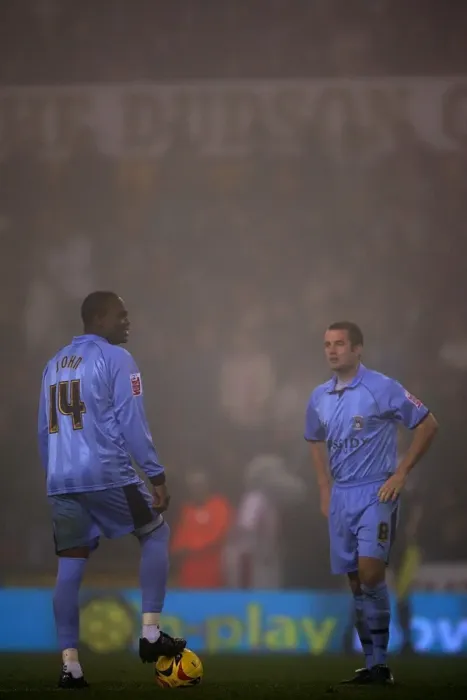 Framed Print : Foggy Face-off: Stern John and Michael Doyle Before the Kick-off (Coventry City vs Stoke City, 2006) Framed Print : Foggy Face-off: Stern John and Michael Doyle Before the Kick-off (Coventry City vs Stoke City, 2006)