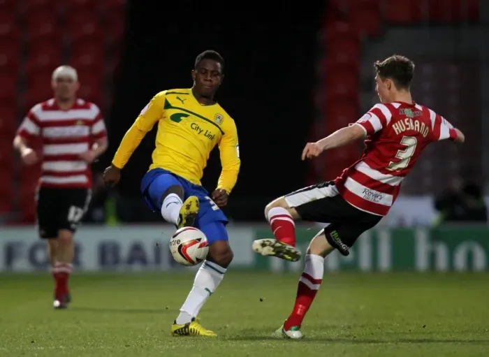 Framed Print : Franck Moussa Outmuscles James Husband: Coventry City's Edge over Doncaster Rovers in npower Football League One Framed Print : Franck Moussa Outmuscles James Husband: Coventry City's Edge over Doncaster Rovers in npower Football League One