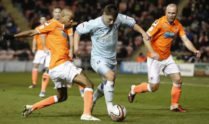 Framed Print : Gary Deegan Dodges Ludovic Sylvestre: Tight Chase in Coventry City vs Blackpool (31-01-2012) Framed Print : Gary Deegan Dodges Ludovic Sylvestre: Tight Chase in Coventry City vs Blackpool (31-01-2012)