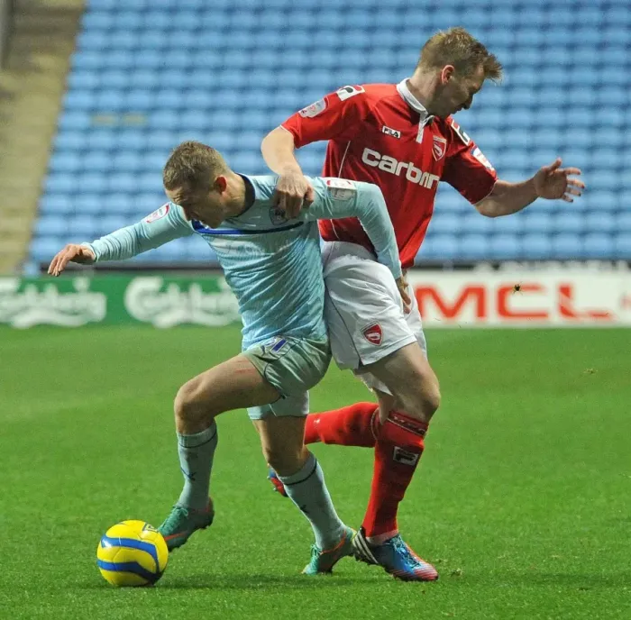 Framed Print : Gary McSheffrey vs. Andrew Wright: FA Cup Battle at Ricoh Arena - Coventry City vs. Morecambe Framed Print : Gary McSheffrey vs. Andrew Wright: FA Cup Battle at Ricoh Arena - Coventry City vs. Morecambe