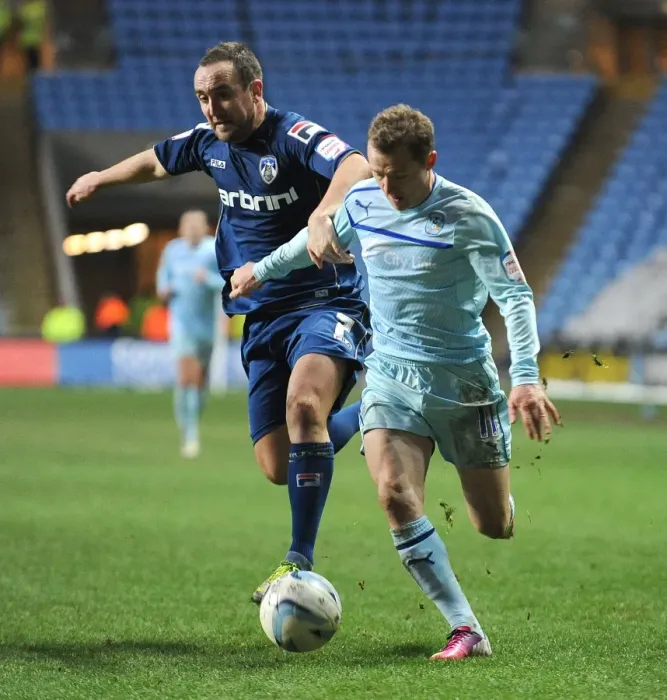 Framed Print : Gary McSheffrey vs Connor Brown: Intense Rivalry in Coventry City vs Oldham Npower League One Clash at Ricoh Arena Framed Print : Gary McSheffrey vs Connor Brown: Intense Rivalry in Coventry City vs Oldham Npower League One Clash at Ricoh Arena