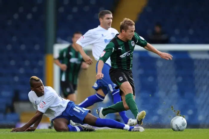 Framed Print : Gary McSheffrey vs Damien Mozika: Intense Battle for the Carling Cup Ball at Gigg Lane (Coventry City vs Bury, Round 1, 2011) Framed Print : Gary McSheffrey vs Damien Mozika: Intense Battle for the Carling Cup Ball at Gigg Lane (Coventry City vs Bury, Round 1, 2011)