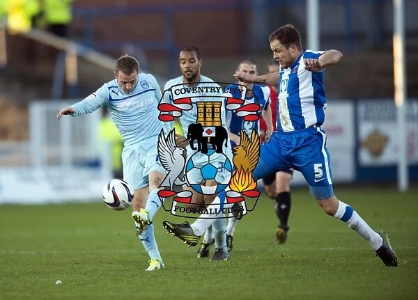 Gary McSheffrey's Tense Shot Under Pressure from Hartlepool United's Sam Collins (Coventry City vs Hartlepool United, Football League One, Victoria Park, 17-11-2012)