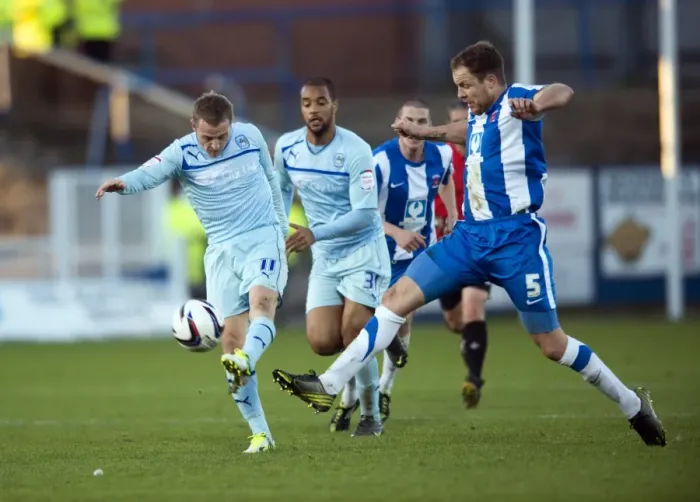 Framed Print : Gary McSheffrey's Tense Shot Under Pressure from Hartlepool United's Sam Collins (Coventry City vs Hartlepool United, Football League One, Victoria Park, 17-11-2012) Framed Print : Gary McSheffrey's Tense Shot Under Pressure from Hartlepool United's Sam Collins (Coventry City vs Hartlepool United, Football League One, Victoria Park, 17-11-2012)