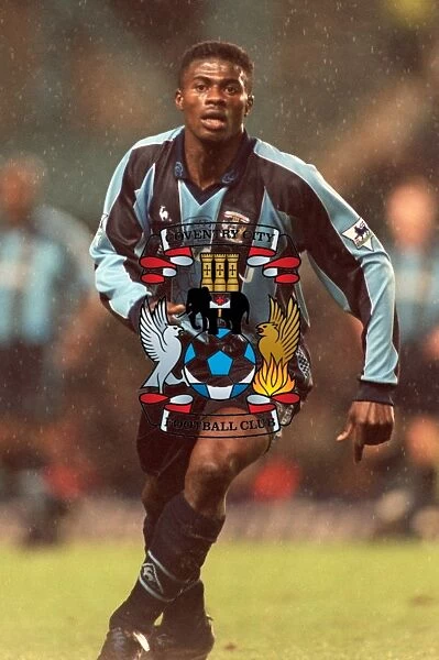 George Boateng Stands Firm Against Manchester United: A Tense Moment in Coventry City's FA Carling Premiership (December 1997)