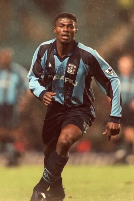 Framed Print : George Boateng Stands Firm Against Manchester United: A Tense Moment in Coventry City's FA Carling Premiership (December 1997) Framed Print : George Boateng Stands Firm Against Manchester United: A Tense Moment in Coventry City's FA Carling Premiership (December 1997)