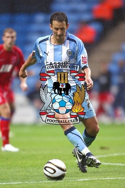 Guillaume Beuzelin in Action: Coventry City vs Aldershot Town in Carling Cup Round 1 at Ricoh Arena