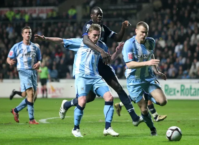 Framed Print : Intense Battle: Chris Samba vs. Ben Turner and Elliott Ward - Coventry City vs. Blackburn Rovers, FA Cup Fifth Round Replay Framed Print : Intense Battle: Chris Samba vs. Ben Turner and Elliott Ward - Coventry City vs. Blackburn Rovers, FA Cup Fifth Round Replay