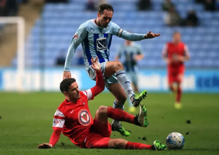 Framed Print : Intense Battle: Jim O'Brien vs Mathieu Baudry in Sky Bet League One Clash Framed Print : Intense Battle: Jim O'Brien vs Mathieu Baudry in Sky Bet League One Clash