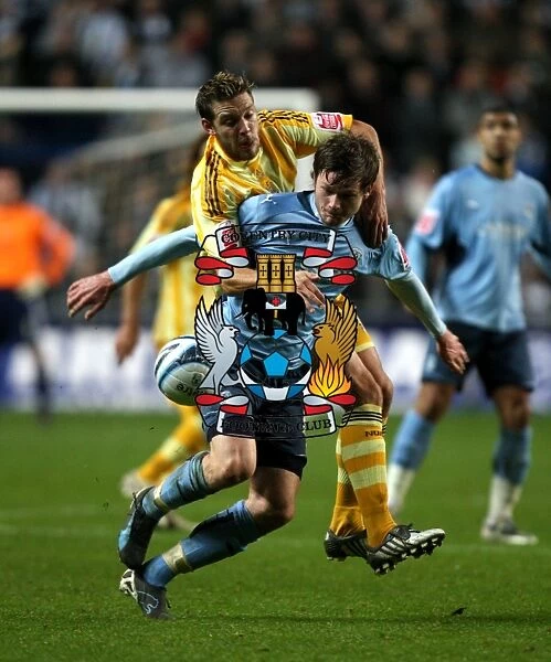 Intense Battle for Possession: Coventry City vs Newcastle United (Championship Clash at Ricoh Arena, 09-12-2009)