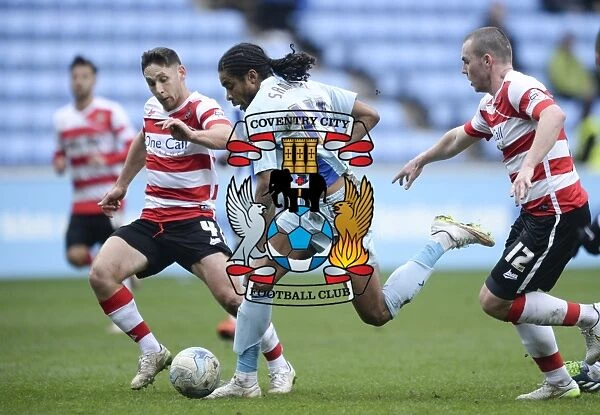 Intense Clash: Furman, McCullough, and Samuel Battle it Out in Coventry City vs Doncaster Rovers