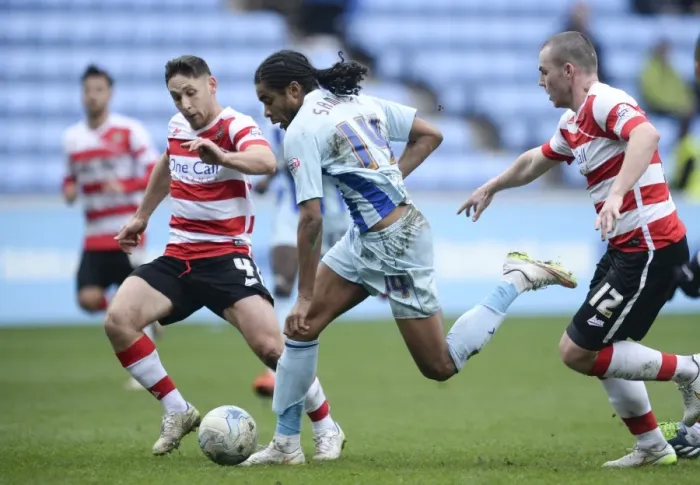 Framed Print : Intense Clash: Furman, McCullough, and Samuel Battle it Out in Coventry City vs Doncaster Rovers Framed Print : Intense Clash: Furman, McCullough, and Samuel Battle it Out in Coventry City vs Doncaster Rovers