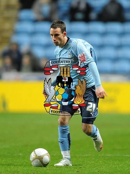Intense Moment: Michael McIndoe in FA Cup Third Round Replay Action for Coventry City vs Portsmouth at Ricoh Arena