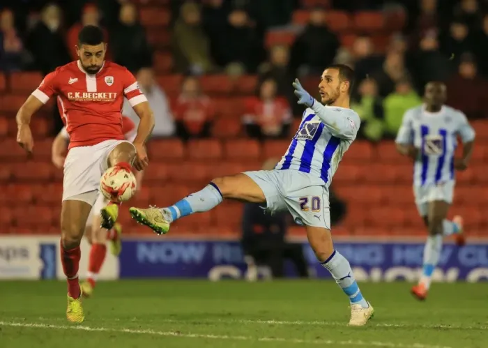 Framed Print : Intense Rivalry: Barnsley vs Coventry City - A Fight for Supremacy in Sky Bet League One: The Epic Duel of Lewin Nyatanga and Marcus Tudgay