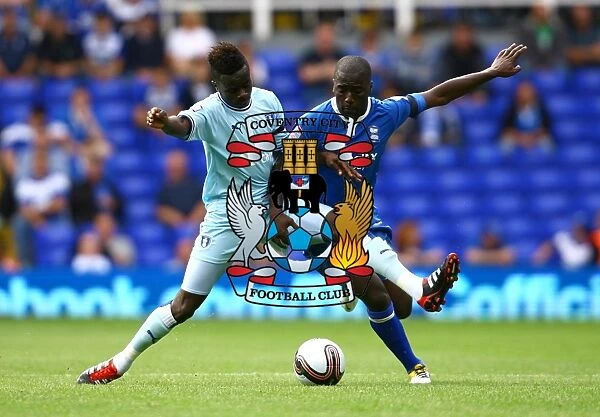 Intense Rivalry: Bigirimana vs. Gomis - The Battle for Ball Supremacy between Coventry City and Birmingham City