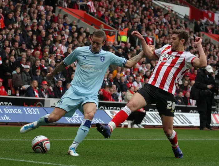 Framed Print : Intense Rivalry: Carl Baker vs. Adam Lallana - Coventry City vs. Southampton Npower Championship Clash (April 2012) Framed Print : Intense Rivalry: Carl Baker vs. Adam Lallana - Coventry City vs. Southampton Npower Championship Clash (April 2012)