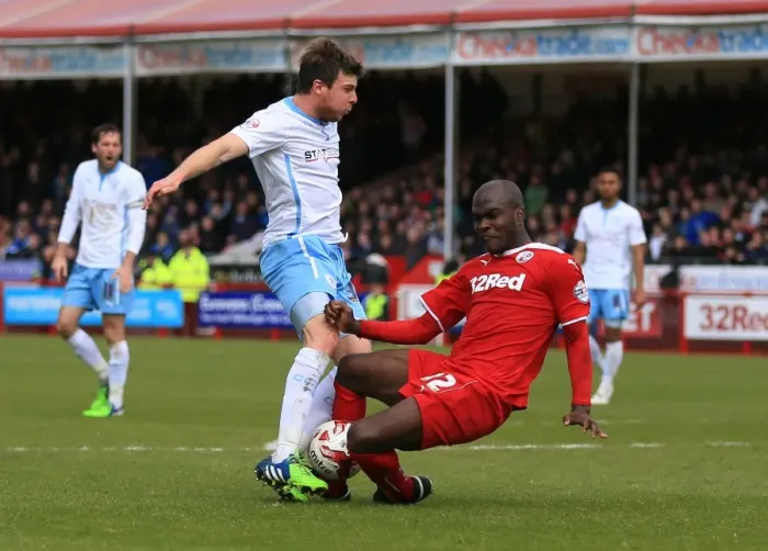 Framed Print : Intense Rivalry: Chris Stokes vs. Kelly Youga - Battle for the Ball in Sky Bet League One Framed Print : Intense Rivalry: Chris Stokes vs. Kelly Youga - Battle for the Ball in Sky Bet League One