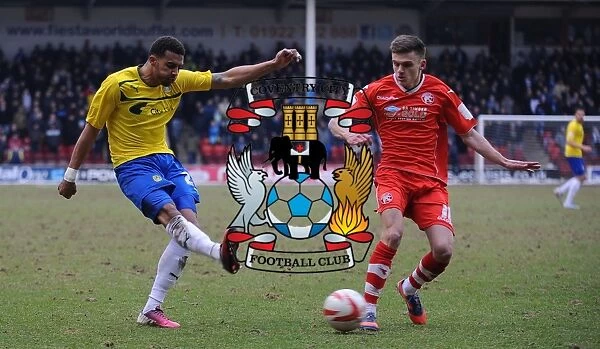 Intense Rivalry: Cyrus Christie vs. Jamie Paterson - A Pivotal Moment in the Npower League One Clash between Walsall and Coventry City (April 2013)