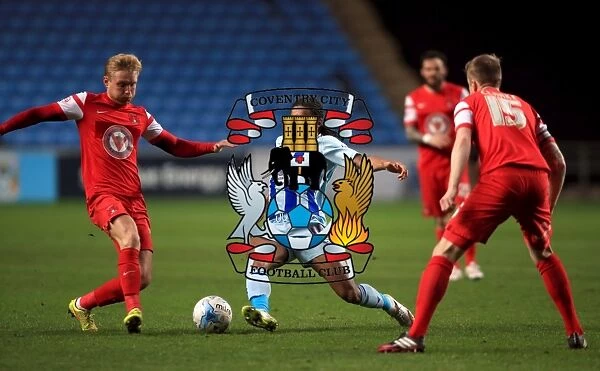 Intense Rivalry: Dominic Samuel vs. Josh Wright's Battle for Ball Supremacy in Coventry City vs. Leyton Orient (Sky Bet League One)