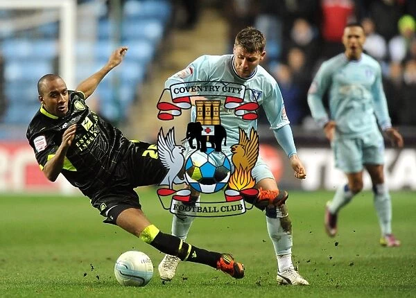 Intense Rivalry: Fabian Delph vs. Gary Deegan Clash in Coventry City vs. Leeds United Championship Match (14-02-2012, Ricoh Arena)