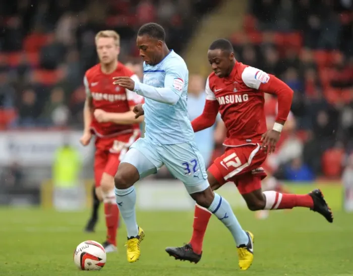Framed Print : Intense Rivalry: Franck Moussa vs. Moses Odubajo Battle at Brisbane Road - Coventry City vs. Leyton Orient (Npower League One, 2012) Framed Print : Intense Rivalry: Franck Moussa vs. Moses Odubajo Battle at Brisbane Road - Coventry City vs. Leyton Orient (Npower League One, 2012)