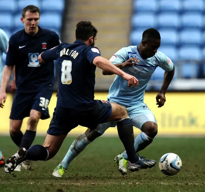 Framed Print : Intense Rivalry: Franck Moussa vs. Simon Walton - Coventry City vs. Hartlepool United Npower League One Clash at Ricoh Arena Framed Print : Intense Rivalry: Franck Moussa vs. Simon Walton - Coventry City vs. Hartlepool United Npower League One Clash at Ricoh Arena