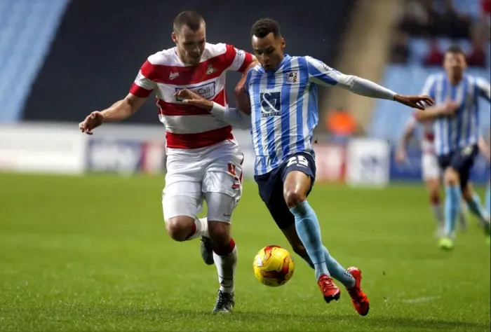 Framed Print : Intense Rivalry: Jacob Murphy vs. Luke McCullough in Coventry City's Sky Bet League One Clash against Doncaster Rovers Framed Print : Intense Rivalry: Jacob Murphy vs. Luke McCullough in Coventry City's Sky Bet League One Clash against Doncaster Rovers