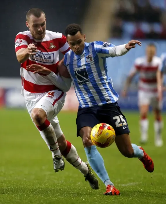 Framed Print : Intense Rivalry: Jacob Murphy vs Luke McCullough in Coventry City's Sky Bet League One Clash against Doncaster Rovers
