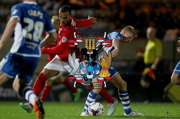 Intense Rivalry: Jamie Allen vs Marcus Tudgay Clash in Coventry City's Capital One Cup Battle against Rochdale