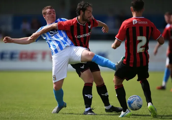 Framed Print : Intense Rivalry: John Fleck vs. Danny Hylton's Battle for Ball Supremacy in Coventry City's Pre-Season Clash against Oxford United Framed Print : Intense Rivalry: John Fleck vs. Danny Hylton's Battle for Ball Supremacy in Coventry City's Pre-Season Clash against Oxford United
