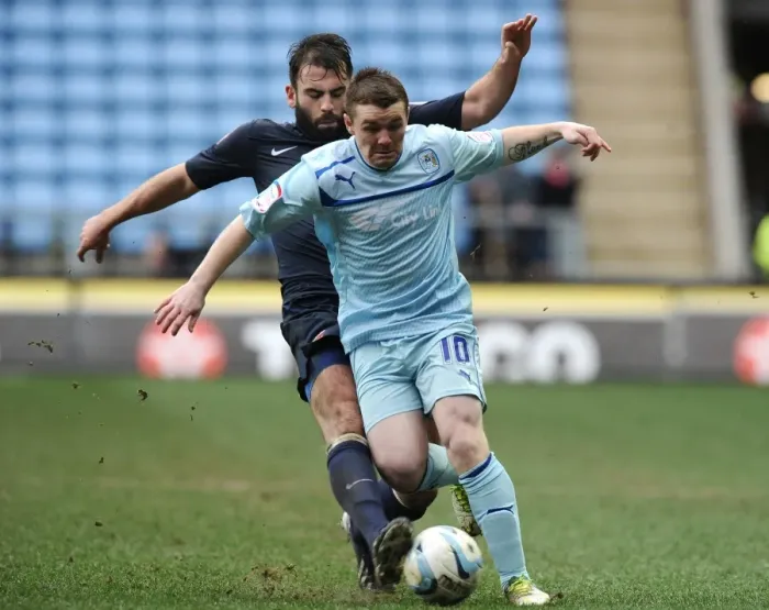 Framed Print : Intense Rivalry: John Fleck vs. Simon Walton's Hard-Fought Tackle in Coventry City vs. Hartlepool United Npower League One Clash Framed Print : Intense Rivalry: John Fleck vs. Simon Walton's Hard-Fought Tackle in Coventry City vs. Hartlepool United Npower League One Clash