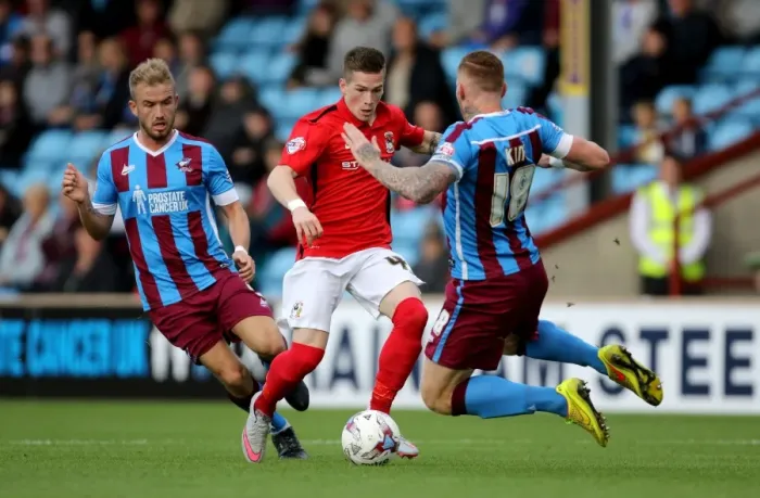 Framed Print : Intense Rivalry: King vs. Kent Clash in Sky Bet League One - Scunthorpe vs. Coventry