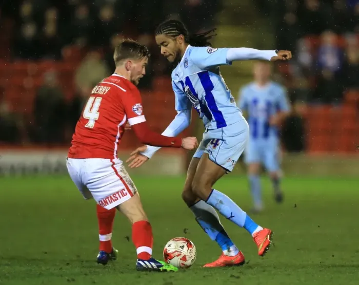 Framed Print : Intense Rivalry: Luke Berry vs Dominic Samuel Battle for Supremacy in Coventry City vs Barnsley's Sky Bet League One Clash