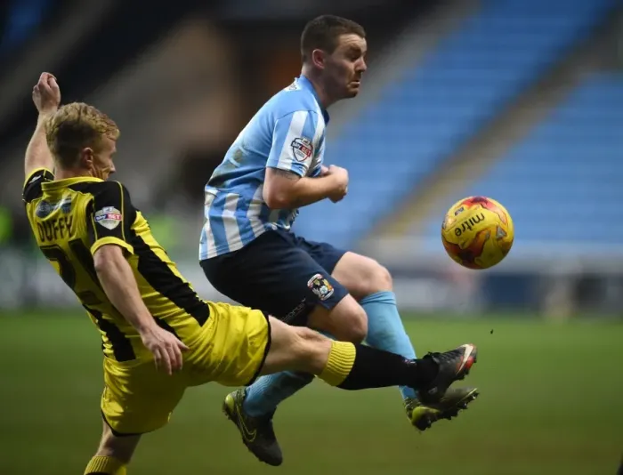 Framed Print : Intense Rivalry: Mark Duffy vs John Fleck Battle in Coventry City vs Burton Albion League One Clash at Ricoh Arena Framed Print : Intense Rivalry: Mark Duffy vs John Fleck Battle in Coventry City vs Burton Albion League One Clash at Ricoh Arena