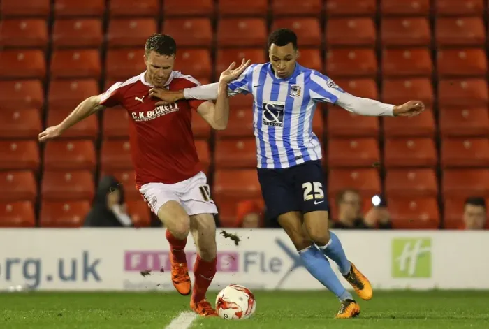Framed Print : Intense Rivalry: Marley Watkins vs. Jacob Murphy in Sky Bet League One Clash at Oakwell Framed Print : Intense Rivalry: Marley Watkins vs. Jacob Murphy in Sky Bet League One Clash at Oakwell