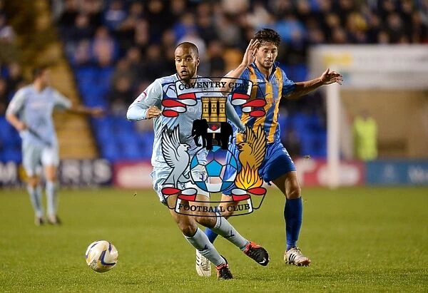 Intense Rivalry: McGoldrick vs Jacobson - A Battle for Supremacy in Coventry City's Npower League One Clash against Shrewsbury Town (September 18, 2012)