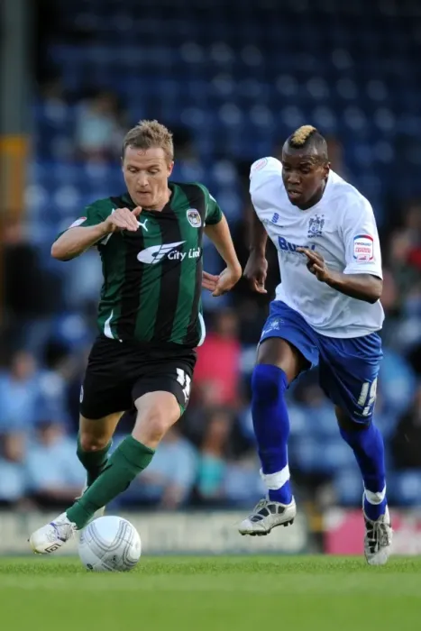 Framed Print : Intense Rivalry: McSheffrey vs. Mozika's Battle for Carling Cup Possession (Bury vs. Coventry City, 2011) Framed Print : Intense Rivalry: McSheffrey vs. Mozika's Battle for Carling Cup Possession (Bury vs. Coventry City, 2011)
