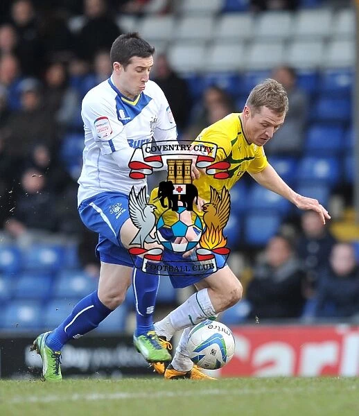 Intense Rivalry: McSheffrey vs Jones Clash in Coventry City's Npower League One Match at Gigg Lane (16-02-2013)