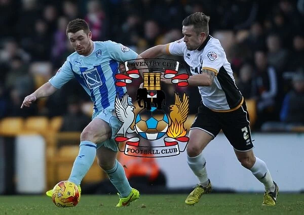 Intense Rivalry: A Moment of Tension Between Adam Yates and John Fleck in Sky Bet League One Clash