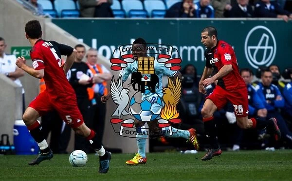 Intense Rivalry: Nimely Chases Down Pearce and Ben Haim, Coventry City vs Portsmouth (24-03-2012)