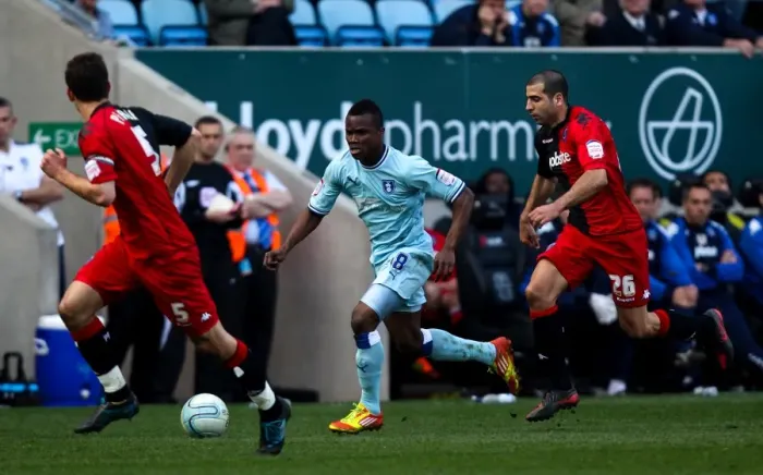 Framed Print : Intense Rivalry: Nimely Chases Down Pearce and Ben Haim, Coventry City vs Portsmouth (24-03-2012) Framed Print : Intense Rivalry: Nimely Chases Down Pearce and Ben Haim, Coventry City vs Portsmouth (24-03-2012)