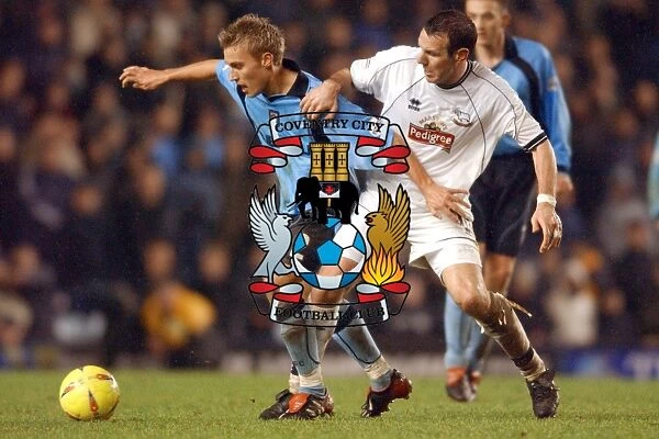 Intense Rivalry: Pead vs. Burley Clash in Coventry City vs. Derby County (Nationwide League Division One, 21-12-2002)