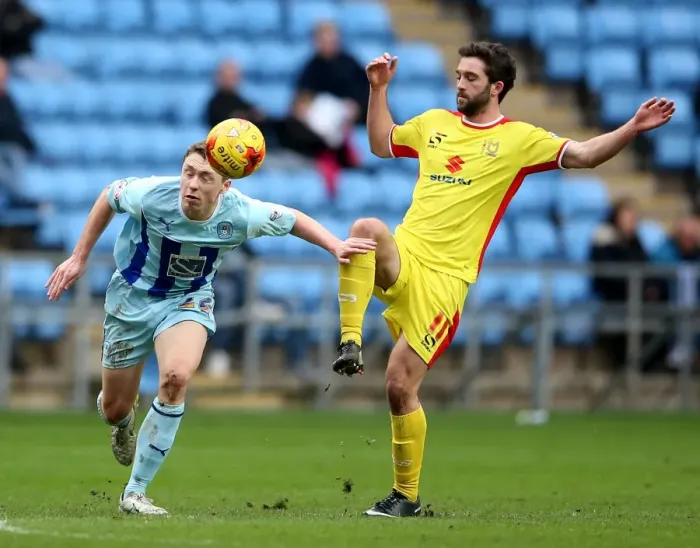 Framed Print : Intense Rivalry: Pennington vs. Grigg in Coventry City vs. Milton Keynes Dons League One Clash at Ricoh Arena Framed Print : Intense Rivalry: Pennington vs. Grigg in Coventry City vs. Milton Keynes Dons League One Clash at Ricoh Arena