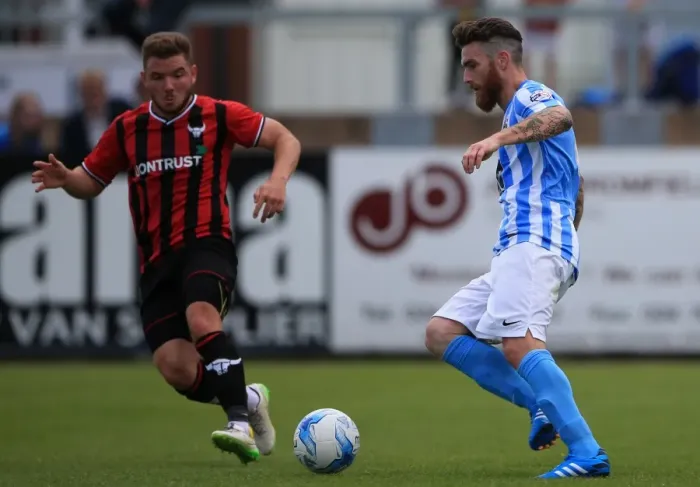Framed Print : Intense Rivalry: Romain Vincelot vs. Alex McDonald Clash in Coventry City vs. Oxford United Pre-Season Friendly Framed Print : Intense Rivalry: Romain Vincelot vs. Alex McDonald Clash in Coventry City vs. Oxford United Pre-Season Friendly