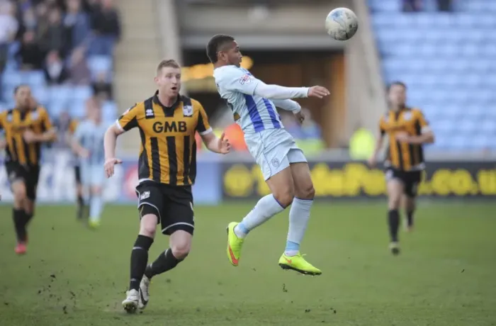 Framed Print : Intense Rivalry: Simeon Jackson vs Chris Robertson Clash in Coventry City vs Port Vale Sky Bet League One Match Framed Print : Intense Rivalry: Simeon Jackson vs Chris Robertson Clash in Coventry City vs Port Vale Sky Bet League One Match