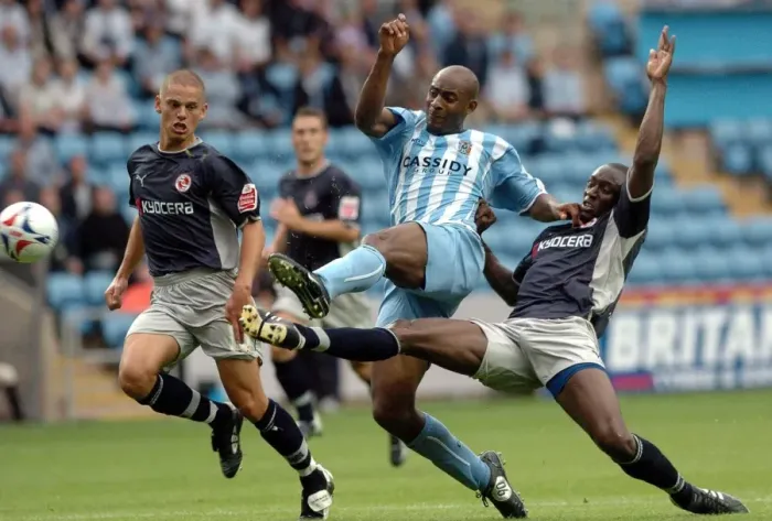 Framed Print : Intense Tackle: Dele Adebola vs Ibrahima Sonko, Coventry City vs Reading (September 10, 2005) Framed Print : Intense Tackle: Dele Adebola vs Ibrahima Sonko, Coventry City vs Reading (September 10, 2005)