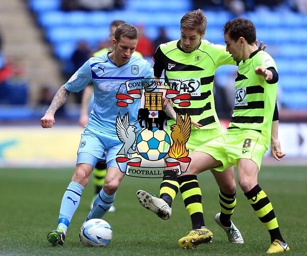 Intense Triangle Tackle: Carl Baker vs. Sam Foley and Edward Upson (Coventry City vs. Yeovil Town, Npower League One)