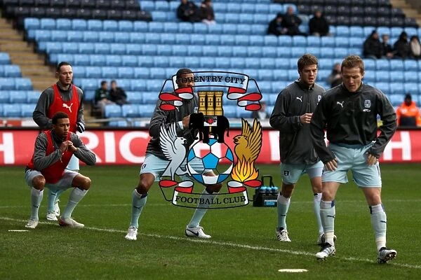 Intense Warm-Up: Coventry City Players Prepare for Championship Showdown against Middlesbrough (21-01-2012, Ricoh Arena)