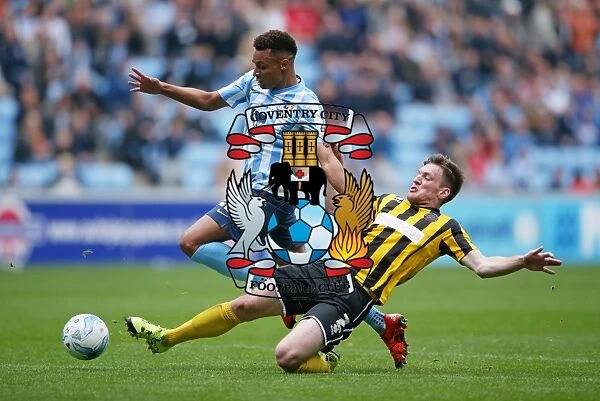 Jacob Murphy Evades Matt Tootle in Sky Bet League One Showdown at Ricoh Arena
