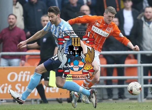 Jim McAlister vs Aaron Martin: A Battle in the Sky Bet League One Clash between Blackpool and Coventry City at Bloomfield Road